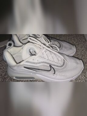 Nike Women's White Sneakers with Black Swoosh